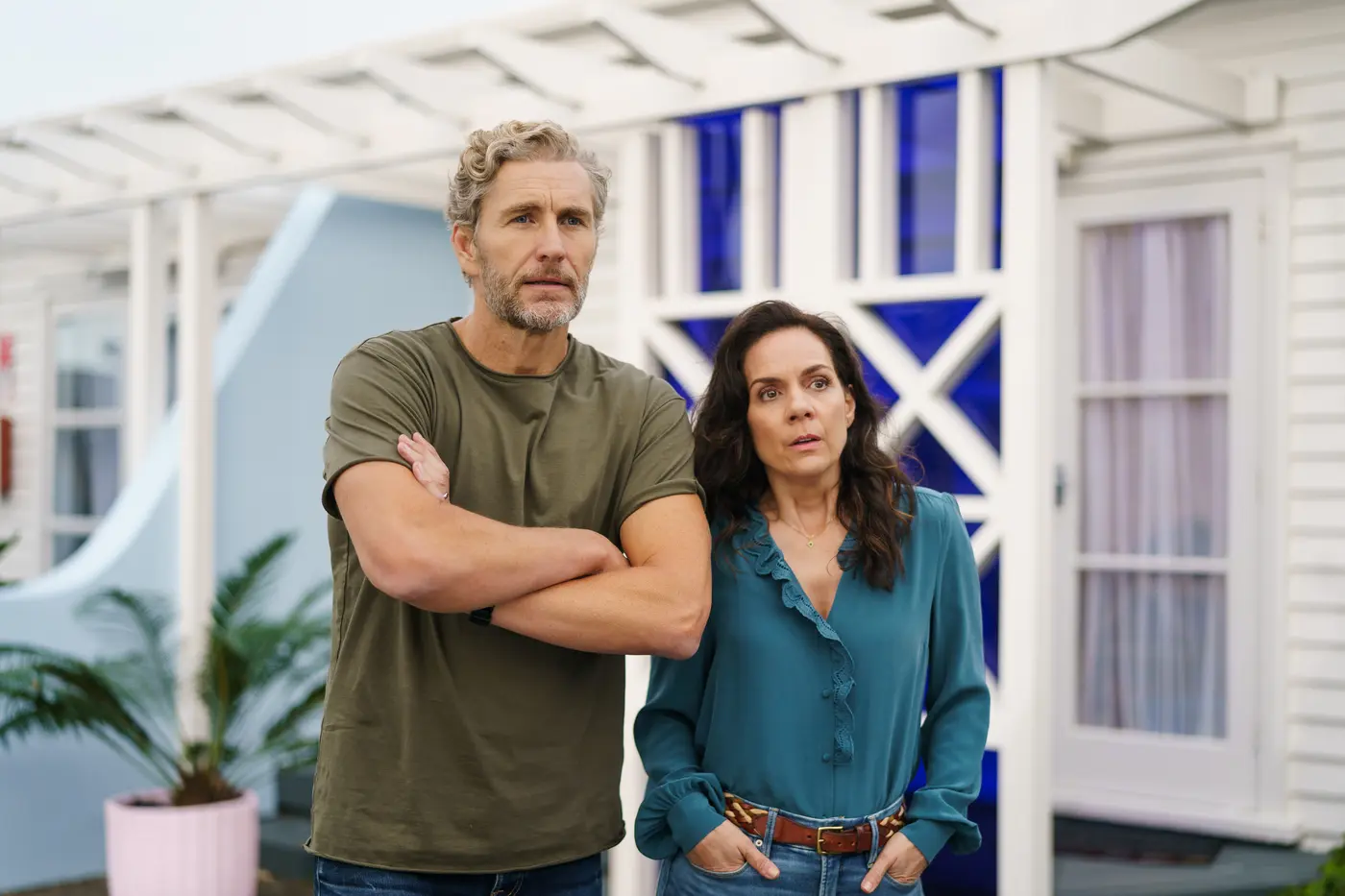 Vanessa "Vinny" Coleman (Michala Banas) and Peter "Cole" Coleman (Brett Tucker) outside the Blue Motel